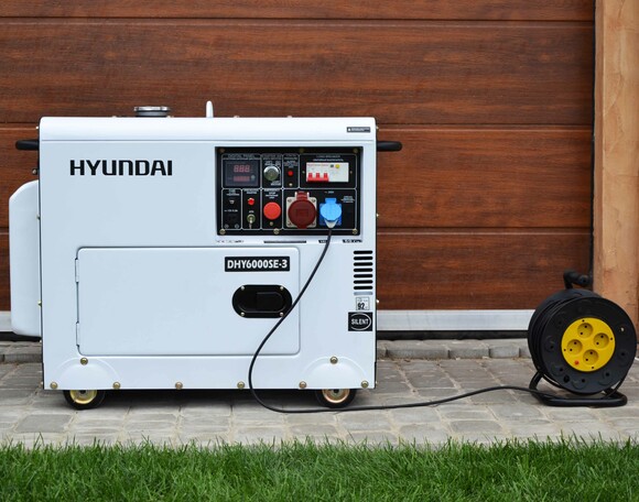 Дизельний генератор Hyundai DHY 6000SE-3 фото 11